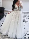 Ball Gown/Princess V-neck Tulle Floor-length Wedding Dresses With Beading #UKM00023584