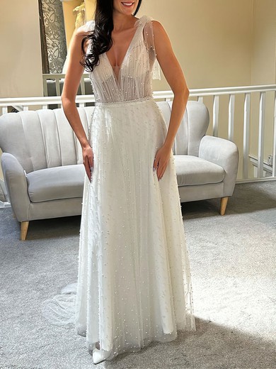 A-line V-neck Tulle Sweep Train Wedding Dress With Pearl Detailing #UKM00027846