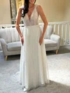 A-line V-neck Tulle Sweep Train Wedding Dress With Pearl Detailing #UKM00027846